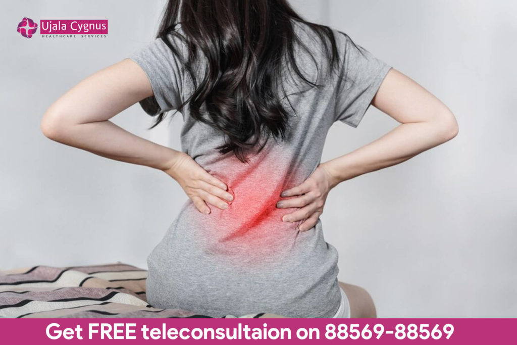 Tailbone Pain Relief, Coccydynia. Coccyx pain during pregnancy Stock Photo